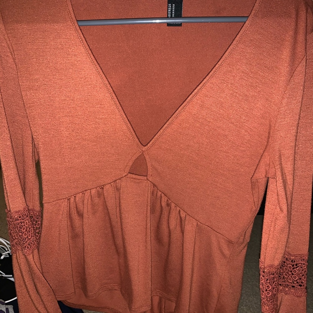 Orange long sleeve deep V